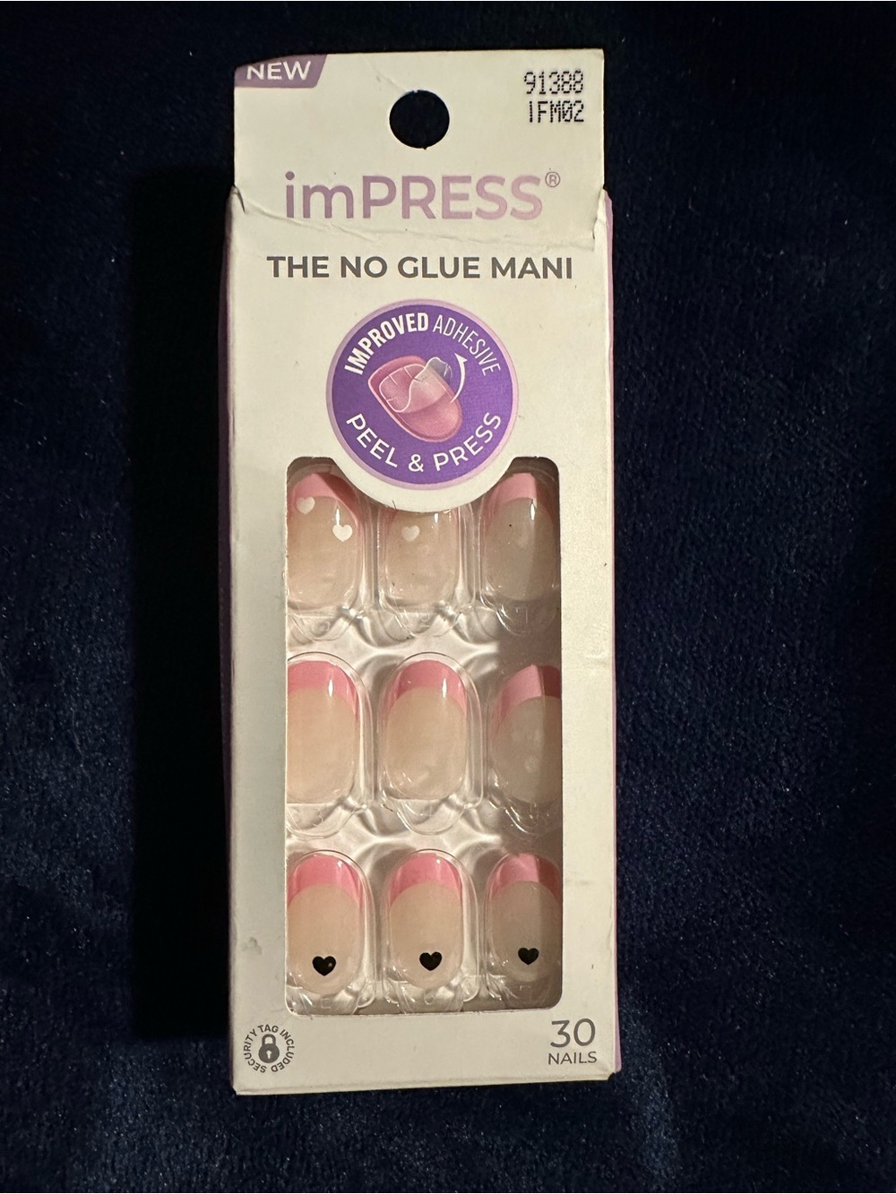 Impress press on nails with pink French tips